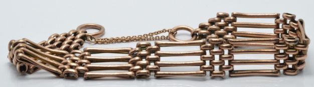 A 9ct rose gold gate bracelet, 15.9g