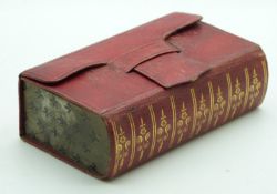 Georgian child's red leather workbox with folding bone ruler, fitted interior with accessories and