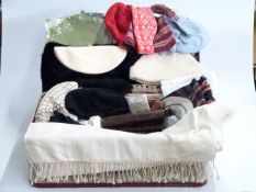 Mixed textiles in vintage suitcase including furs, crocodile skin handbag, hats, linen, etc