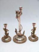 Set of three silver plated novelty candlesticks in the form of anchors with rope, height of