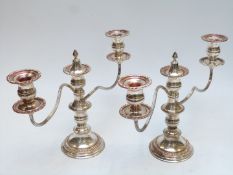 Pair of silver plated candelabra, height 24.5cm.
