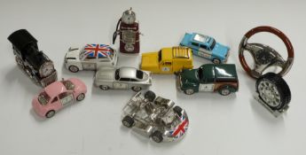 A collection of motoring related novelty miniature clocks to include Mini, Panda car, Morris