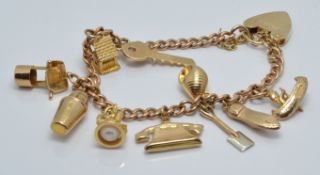 A 9ct gold charm bracelet with thirteen 9ct gold charms, 20g