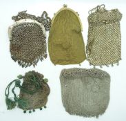 Five silver mesh, cut steel and engraved metal purses, largest 16 x 10cm