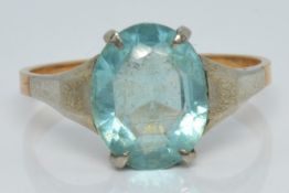A 9ct gold ring set with blue paste, 1.8g, size L