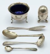 Hallmarked silver items including open salt with blue glass liner, Victorian pepper, Sheffield