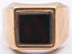 A 9ct gold signet ring set with bloodstone, 9.3g, size S