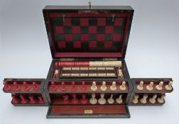 Coromandel cased 'The Royal Cabinet of Games', games compendium, with tooled leather board to lid,