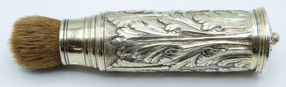 19thC gilt white metal travelling brush with fine acanthus leaf decoration, length 12cm