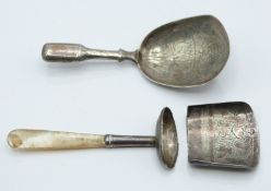 Two Georgian hallmarked silver caddy spoons, one with mother of pearl handle, Birmingham 1818