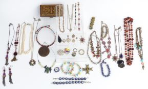 A collection of jewellery including Victorian silver lockets, silver enamelled fob watch, silver