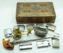 Hallmarked silver button hook, hallmarked silver sugar tongs, stamp case marked sterling silver,