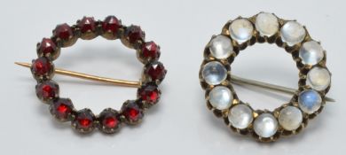 Two Victorian brooches, one set with moonstone cabochons the other Bohemian cut garnets