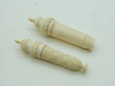Two 19thC turned ivory pedestal free standing needle cases, tallest 8cm