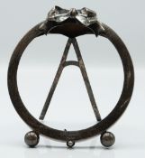 Victorian hallmarked silver circular photograph frame with ribbon finial and easel back,