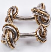 A pair of silver and 18ct gold knot cufflinks marked Tiffany and Co