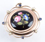 Victorian 9ct gold locket set with an enamel floral plaque with sapphires and seed pearls to the