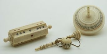 Three 19thC Indian Madras ware ivory and bones toys including a spinning top, cup and ball game