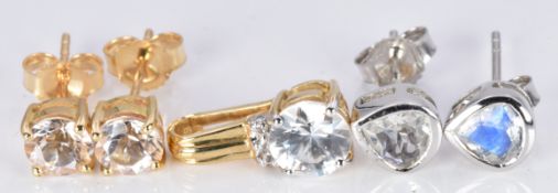 A 9ct gold pendant and two pairs of 9ct gold earrings, all set with zircons