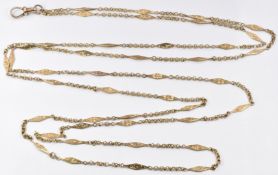 A yellow metal guard chain made up of circular and engraved links, 14.3g