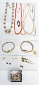 A collection of jewellery including coral, garnet brooch, earrings etc