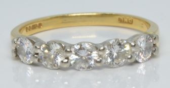 An 18ct gold ring set with five diamonds each approximately 0.15ct, 2.5g, size K/L