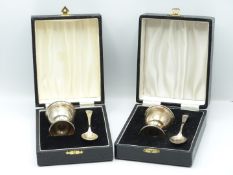Two cased hallmarked silver egg cups and spoons, weight 76g