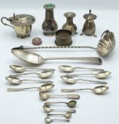 Hallmarked silver items including Georgian table spoon, napkin ring, peppers etc, weight 317g,