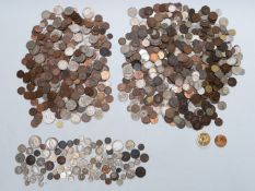 A collection of coins in three tins, includes some overseas, Victoria double florin, rocking horse