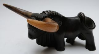 Bronze model of a bull of Art Deco geometric style, with oversize horns, length 21cm