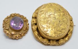 Victorian brooch set with two glass compartments and a Victorian brooch set with an amethyst, length