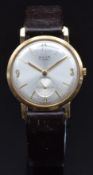 Aviva 9ct gold gentleman's wristwatch with inset subsidiary seconds dial, gold hands, Arabic