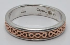 A silver Clogau ring with 9ct gold Celtic design in original box, size S
