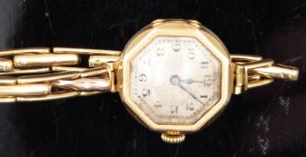Art Deco style 9ct gold ladies wristwatch with blued hands, black Arabic numerals, octagonal