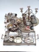 Quantity of silver plate to include wine coaster, large sugar sifter, toast racks, glass based tray,