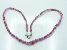 A beaded pink sapphire necklace