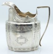 Victorian Irish hallmarked silver cream or milk jug with bright cut decoration, Dublin 1897 maker
