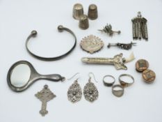 A collection of silver jewellery including rings, pendants, earrings, bangle, Victorian brooch