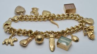 A 9ct gold charm bracelet with thirteen charms including a heart, banknote charms etc, 41.3g