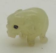 Likely Russian Fabergé miniature jadeite model of an elephant set with sapphire eyes, length 17mm