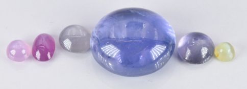 Two loose natural cornflower blue Sri Lankan star sapphires, the largest approximately 0.7ct, and