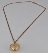 A 9ct gold necklace and 9ct gold heart locket, 9.7g