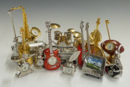 A collection of miniature novelty clocks in the form of musical instruments, sporting items etc
