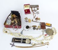 A collection of jewellery including necklaces, silver brooch, other brooches etc