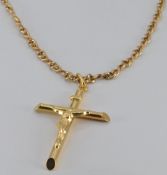 A 9ct gold chain and 9ct gold crucifix, 7.2g