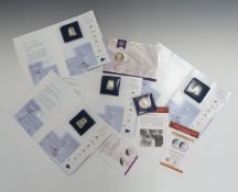 Collection of mostly silver commemorative crowns, in a wooden collector's box