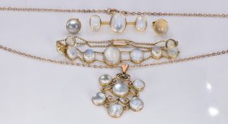 A suite of Victorian jewellery comprising bracelet, earrings and brooch set with moonstones together