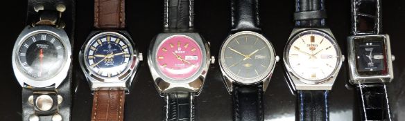 Six gentleman's wristwatches comprising Seiko 5, Ricoh and Citizen, all automatic with day date