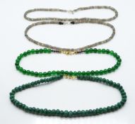 Two quartz necklaces and two labradorite necklaces