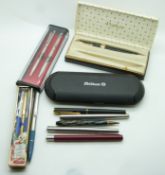 Twelve various pens and propelling pencils to include Pelikan, Parker 17, Unique and various